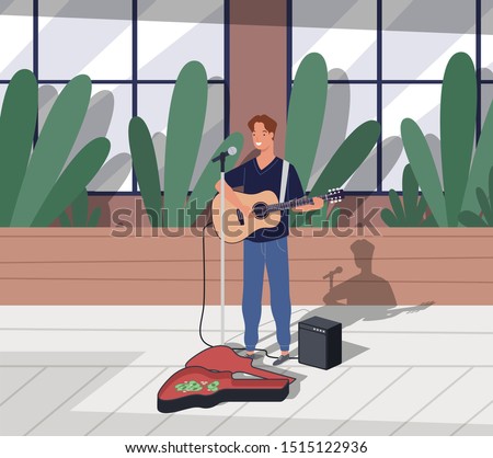 Young happy male guitarist standing and busking by playing guitar on the city road. Street performer man character sing song