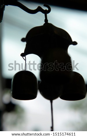 Silhouette picture of door bells, black and white photography. 