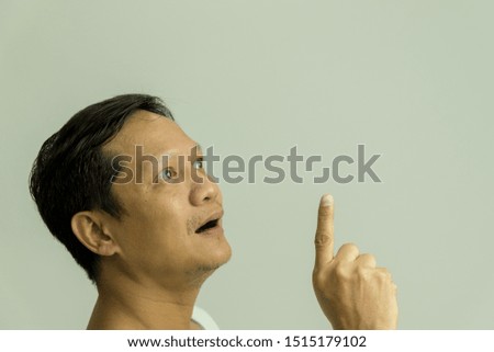 Portrait of an Asian person thinking