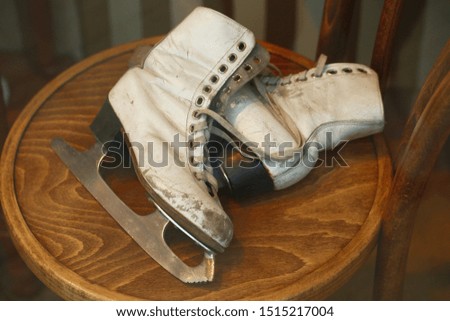 old skates on a chair