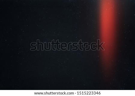 Black abstract background. Photo effect. Retro film wallpaper. Mask. Colorful abstract image. Lens flare and heavy grain texture Royalty-Free Stock Photo #1515223346