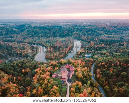 Arial drone photography of early autumn landscape view in Latvia Sigulda. Medieval castle hill.