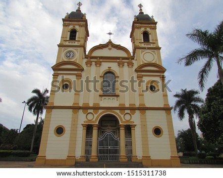 catholic church with blue sky in the background