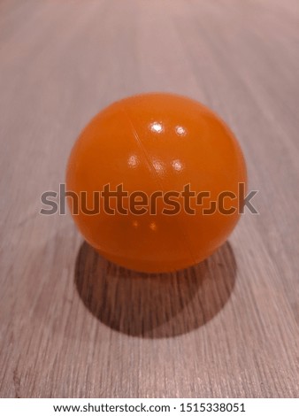Close up photo of orange ball