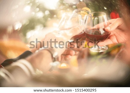 thanksgiving , christmas newyear Group of people having some drinks hand cheers together, celebrating, having fun food on table background