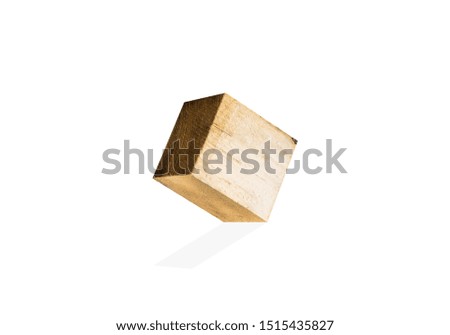 Square wood piece isolated on white background. Cube shape wooden texture.