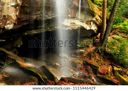 Waterfalls flowing across the North Carolina rocky forest along the Blue Ridge Parkway