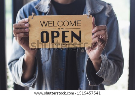 Close up sign hanging open Coffee shop door,Open sign blur background,Label word open