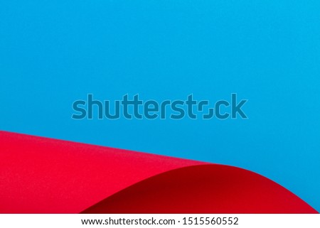 Abstract colorful background. Red and light blue color paper in geometric shapes