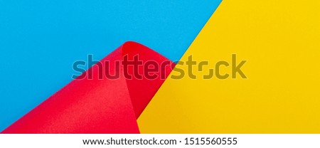 Abstract colorful background. Yellow red blue color paper in geometric shapes