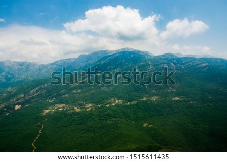 Mountainous and hilly terrain from an airplane flight