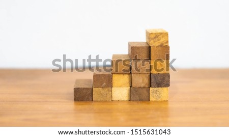 To arrange wooden blocks into steps.
It is an idea for business growth and success.