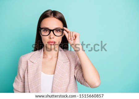 Close-up portrait of her she nice-looking attractive lovely lovable winsome content straight-haired lady touching specs isolated over bright vivid shine blue green teal turquoise background