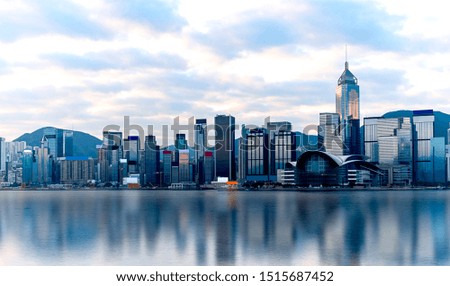 Hong Kong victoria harbour in the morning with water reflection
