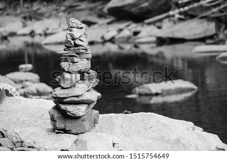 A variety of stones / Inukshuk of Canada beside the creek, Gorge park, Coaticook, Quebec, Canada