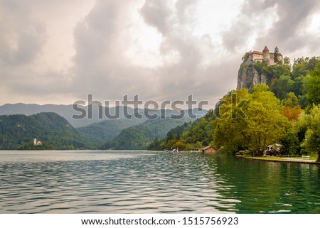 View at the Lake of Bled with Bled Castle and Church of Assumption of Mary in background - Slovenia