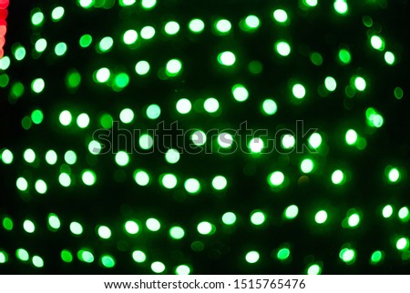 Abstract blurred photo of christmas lights. Christmas boken background.