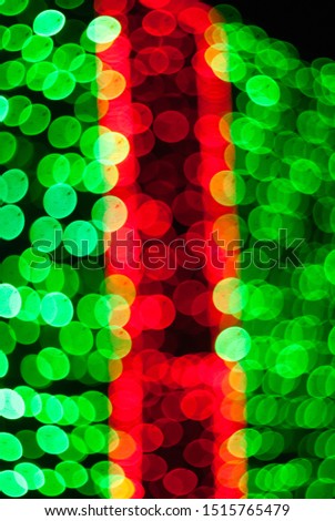 Abstract blurred photo of christmas lights. Christmas boken background.