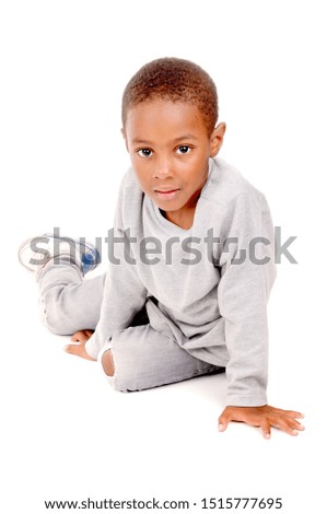 little boy isolated in white