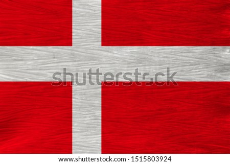 beautiful national flag of Denmark on soft silk with soft folds, close-up, copy space