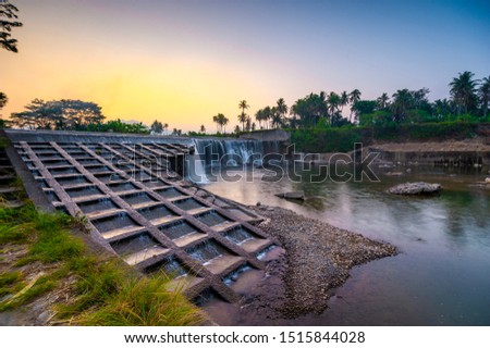 Beautiful light of sunrise view in the beautiful river. This photo take in the one of beautiful place West Sumatra Indonesia.