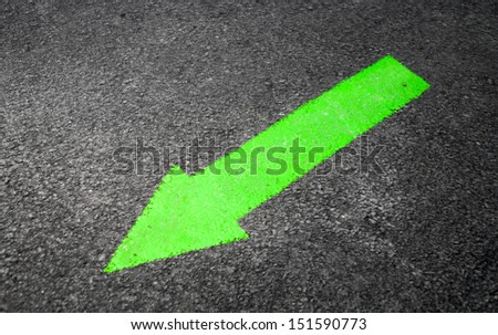 green arrow on the pavement