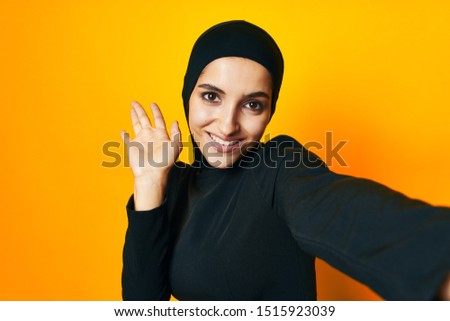 woman with beautiful eyes looking at the camera