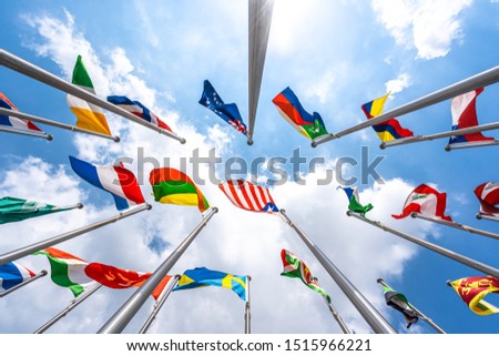 flag of the world with blue sky Royalty-Free Stock Photo #1515966221
