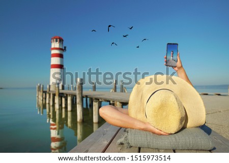 travelling woman resting at the lighthouse, enjoy the day