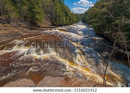 Dramatic Cascades on the Presque Isle River in Spring in Porcupine Mountains State Park in Michigan