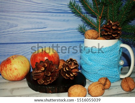 Christmas composition with toys, fir, cones, nuts and cinnamon