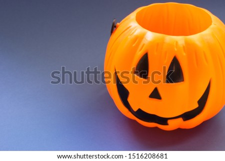 Image of a toy pumpkin. Hallowen party decoration
