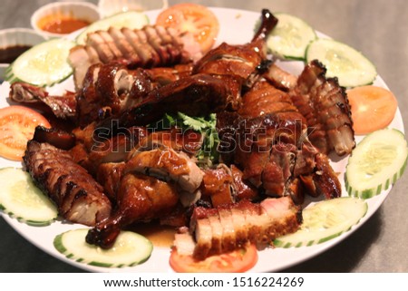 Roasted duck and barbecue pork recipe in Ipoh, Malaysia. One of the most cultural and popular Chinese food in Asia.