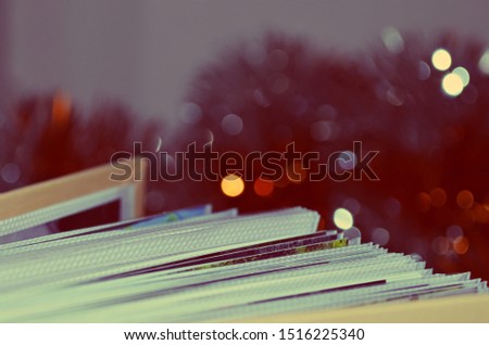 Photo book pages with blurry background