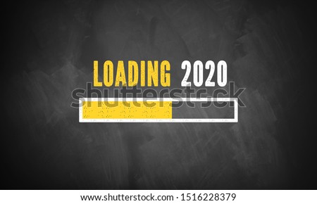 progress bar showing loading of 2020 drawn on a chalkboard Royalty-Free Stock Photo #1516228379