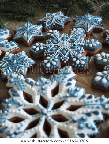Christmas pattern of gingerbread cookies in the shape of snowflakes on  background. 