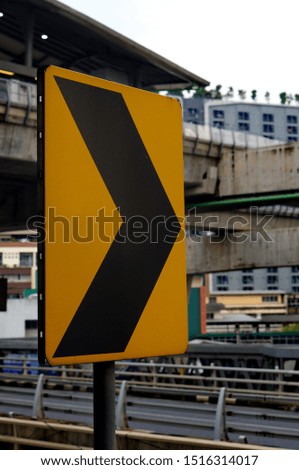Yellow traffic signs used to tell commands on the road.