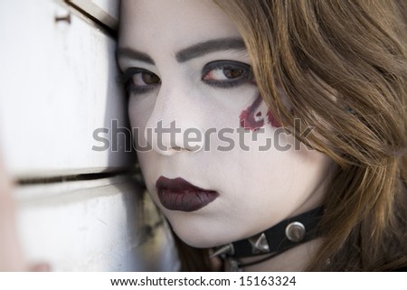 Young Alternative Girl Near A Wall