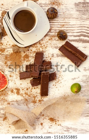 black coffee chocolate with fruit on the table