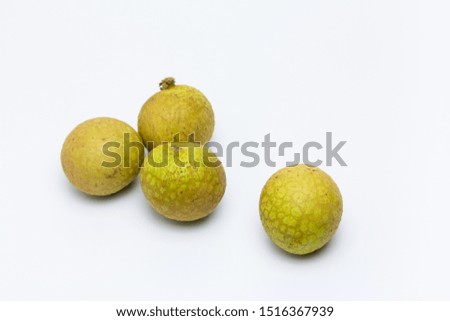 Ripe longan fruits on white background