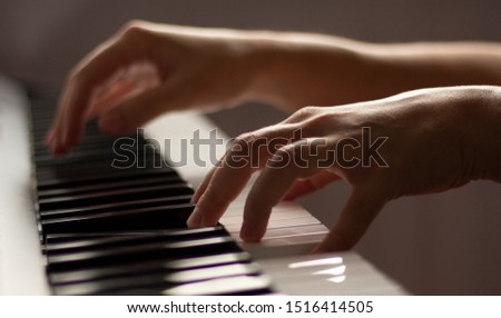 Pianist is playing piano exercise  