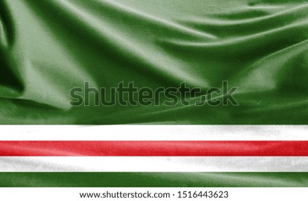 Realistic flag of Chechen Republic of Ichkeria on the wavy surface of fabric