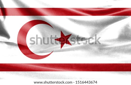 Realistic flag of Turkish Republic of Northern Cyprus on the wavy surface of fabric
