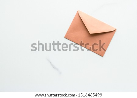 Postal service, newsletter and greeting card concept - Blank paper envelopes on marble flatlay background, holiday mail letter or post card message design Royalty-Free Stock Photo #1516465499