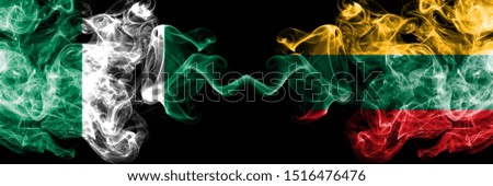 Nigeria vs Lithuania, Lithuanian abstract smoky mystic flags placed side by side. Thick colored silky smoke flags of Nigerian and Lithuania, Lithuanian