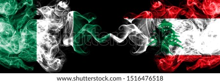 Nigeria vs Lebanon, Lebanese abstract smoky mystic flags placed side by side. Thick colored silky smoke flags of Nigerian and Lebanon, Lebanese