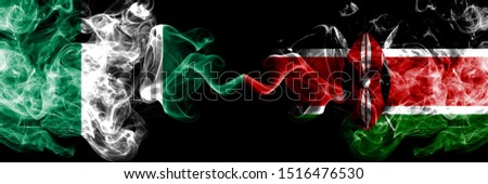 Nigeria vs Kenya, Kenyan abstract smoky mystic flags placed side by side. Thick colored silky smoke flags of Nigerian and Kenya, Kenyan