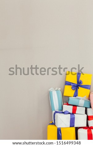 Christmas birthday presents on a gray background