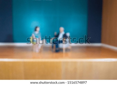 abstract blur background of video camera and people interview in meeting room