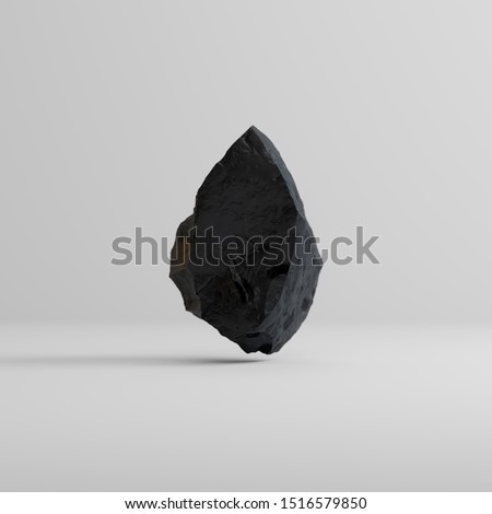 Stone on a black background in the studio with texture